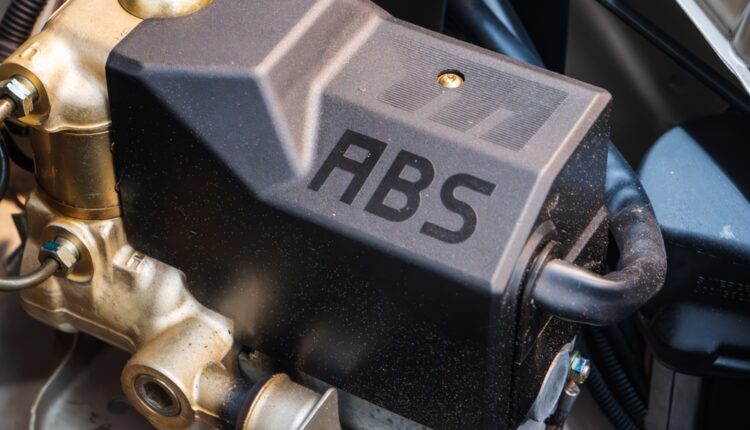 Close-up of an Anti-Lock Brake System (ABS) module in a car engine bay