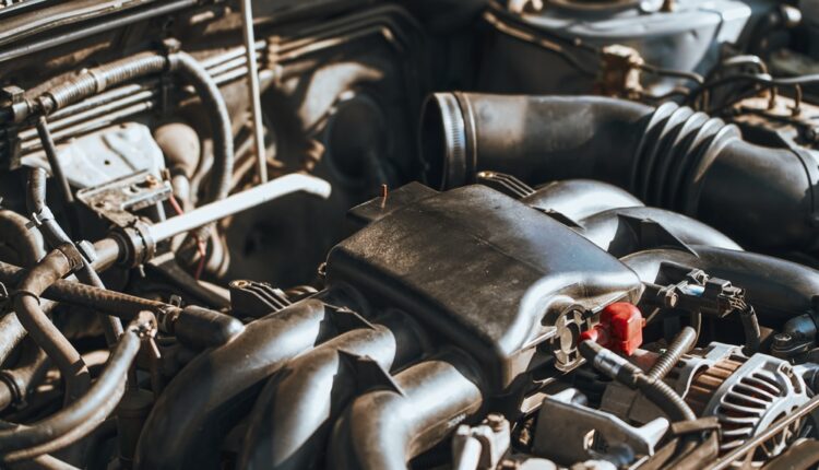 Close-up of a boxer engine under the hood of a performance car