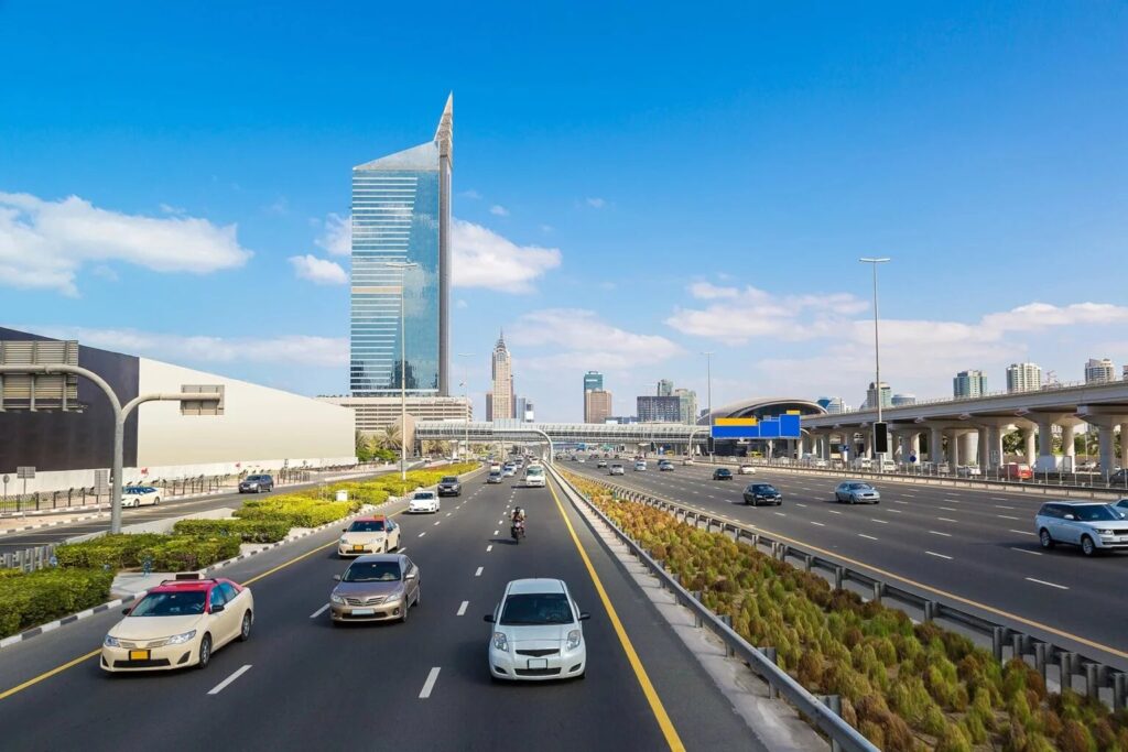 Expat driving car in UAE city street”Step-by-Step Guide for Expats Buying a Used Car in UAE
