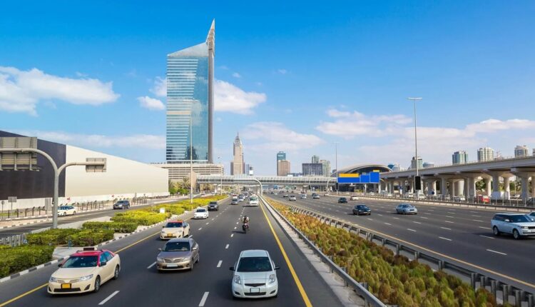 Expat driving car in UAE city street”Step-by-Step Guide for Expats Buying a Used Car in UAE