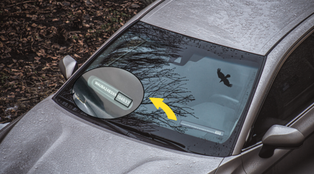 Free VIN check in UAE – car dashboard showing VIN number on windshield