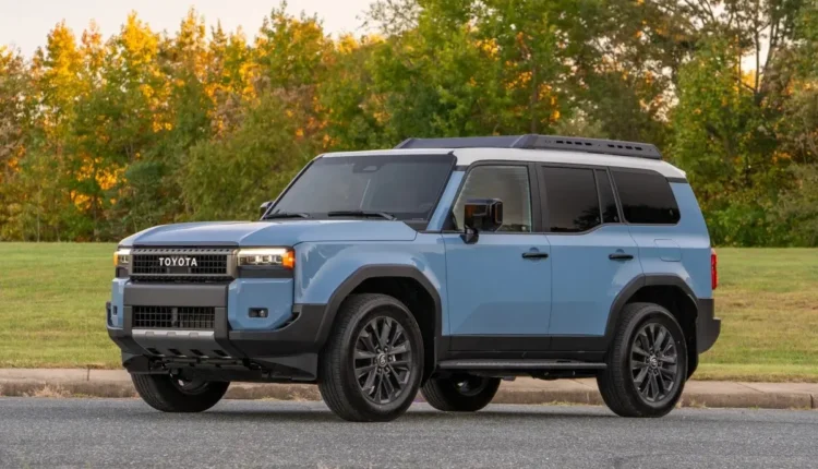 Toyota Land Cruiser versus Nissan Patrol comparison image showing both SUVs side by side on a blue background.