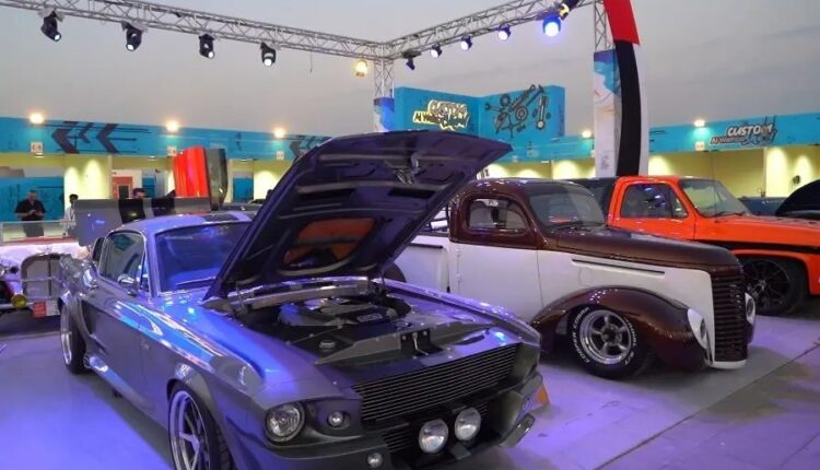 A collection of classic and custom cars on display at the Sheikh Zayed Festival, with a focus on automotive heritage and modern innovation.