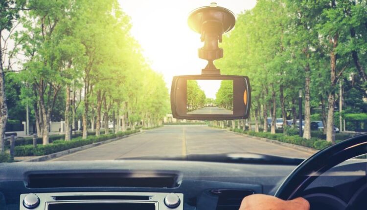 Car dashboard with a dash cam recording the road ahead in the UAE, best dash cams for safety and evidence