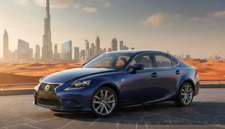UAE used cars 2026 concept showing a Lexus sedan parked on a Dubai road with Burj Khalifa skyline in the background.