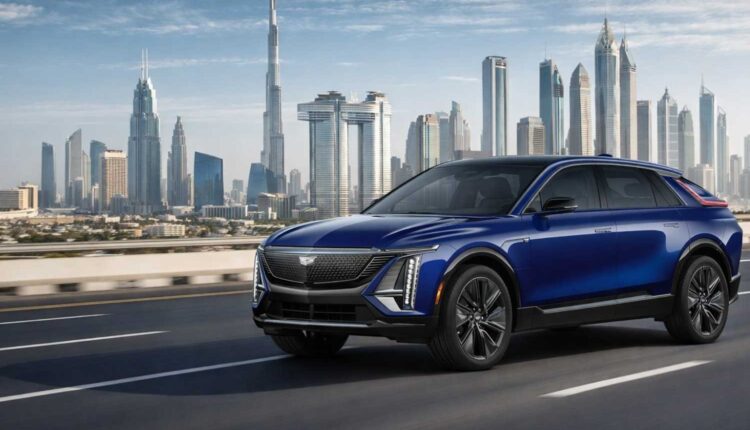 Cadillac LYRIQ electric SUV driving on Sheikh Zayed Road with Dubai skyline in the background
