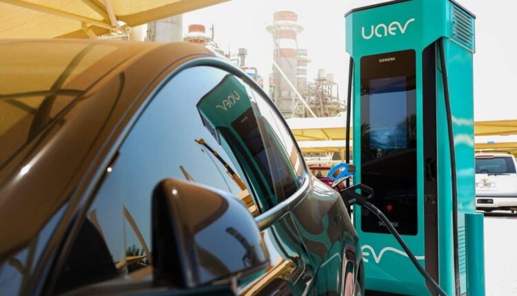 Electric vehicle charging at a UAE EV station, highlighting the region's growing infrastructure for electric mobility.| Arabwheels.ae