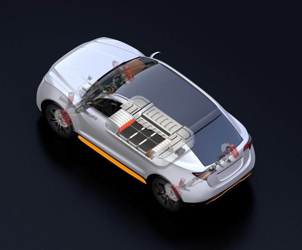 Transparent electric vehicle cutaway showing the battery pack, electric drivetrain components, suspension system and internal vehicle architecture.|عرب ويلز