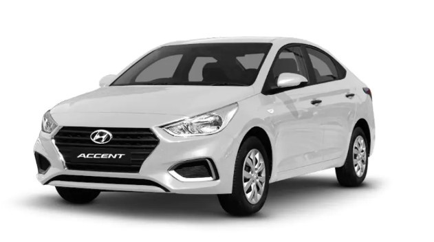White Hyundai Accent sedan on a plain background| Arabwheels.ae