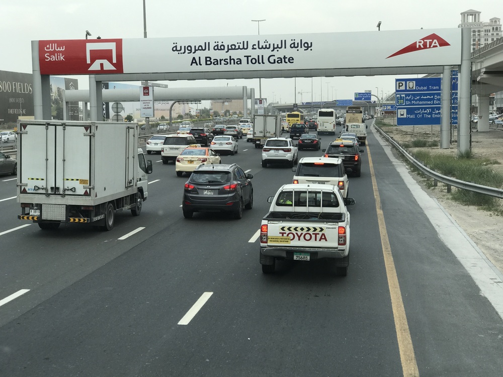 Cars braking in heavy traffic near Al Barsha Toll Gate in Dubai.|Arabwheels.ae